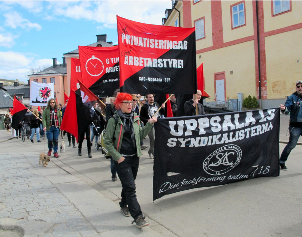Demonstrationståg med fackföreningen Uppsala LS av SAC Syndikalisterna. 