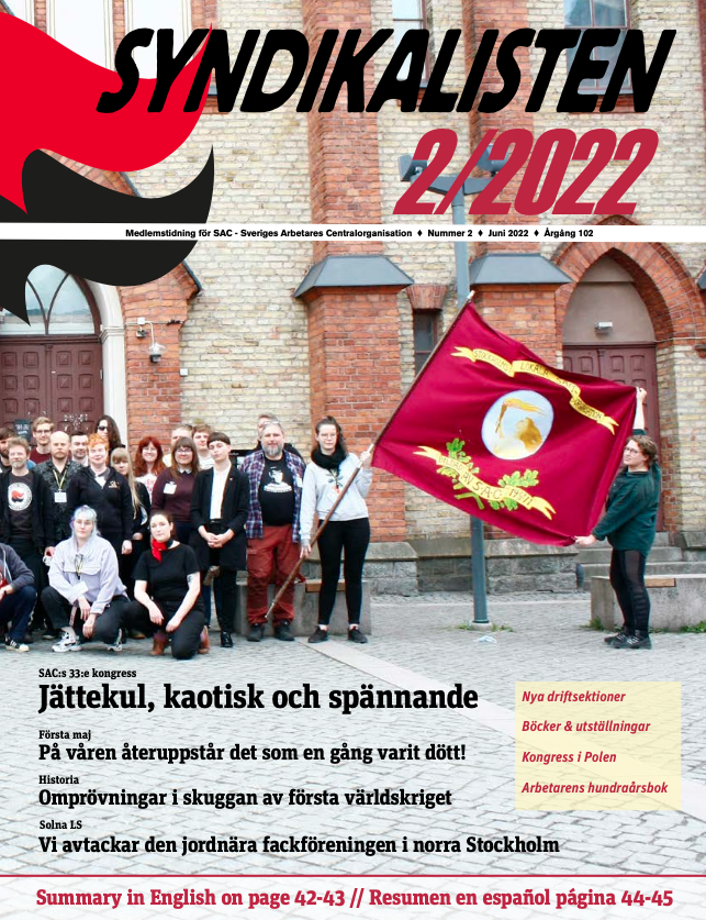 Framsida till SAC:s medlemstidning Syndikalisten, nummer 2, 2022. Bilden visar deltagare i SAC:s kongressi Gävle 2022.